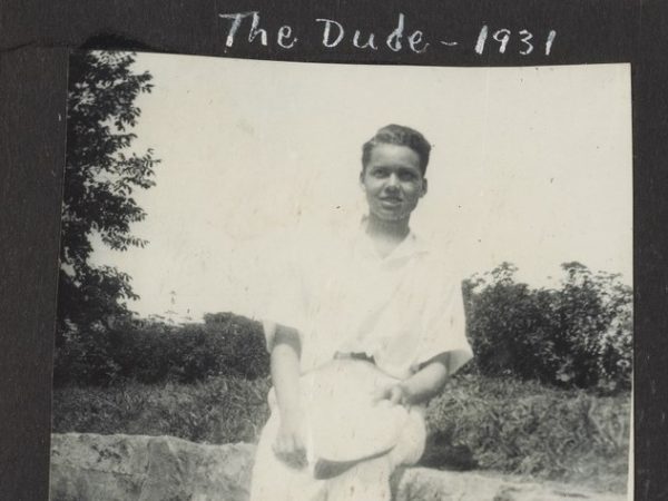 A photo of Pauli Murray seated on a wall captioned "The Dude 1931"