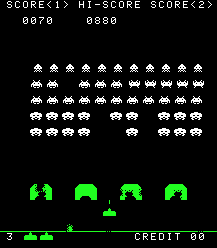 Gameplay of Space Invaders showing a green icon firing at white aliens.